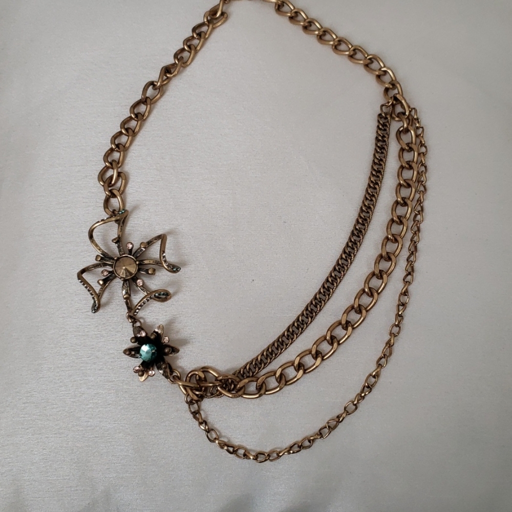 BCBGeneration Y2K gold tone necklace.